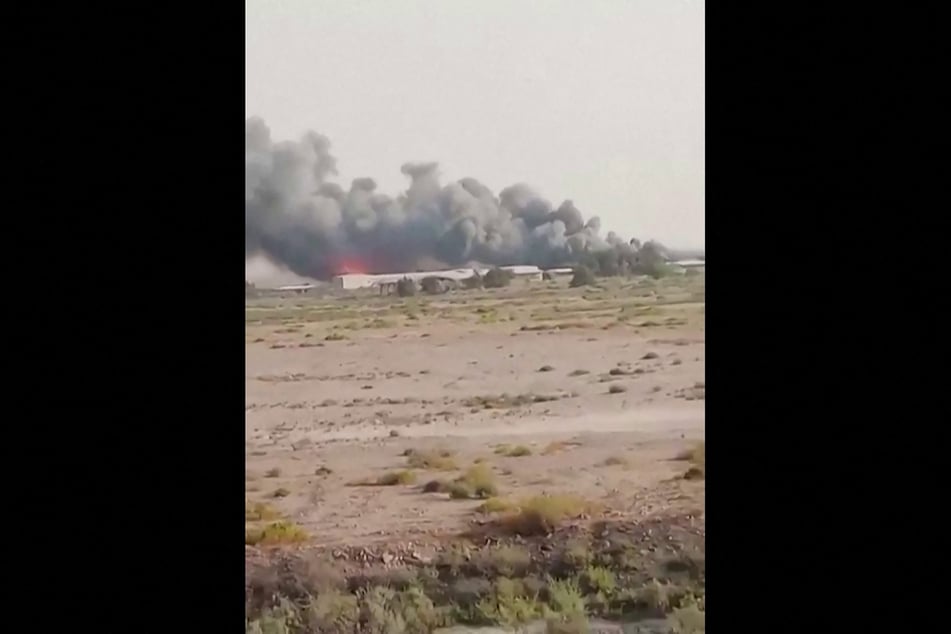 This screenshot of UGC images from July 12, 2026, shows heavy smoke billowing in Abdali, near Kuwait's northern border.