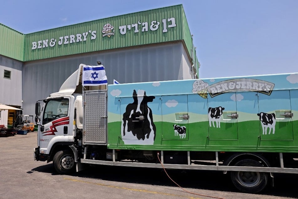 An Israeli flag is set atop a delivery truck outside a Ben & Jerry's factory in Be'er Tuvia, Israel, in July 2021.