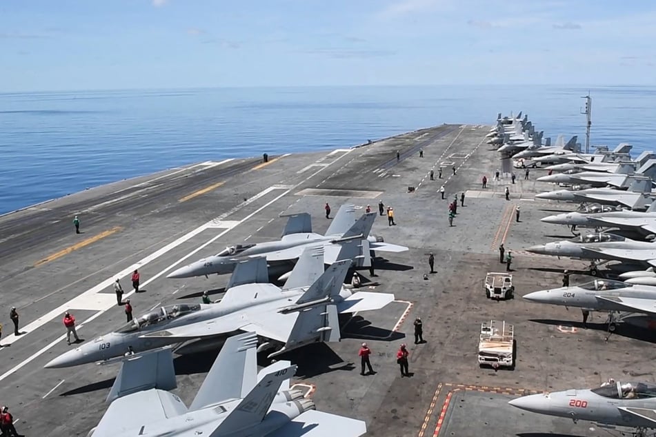 China claims it "drove away" US Navy ship from disputed area of South China Sea