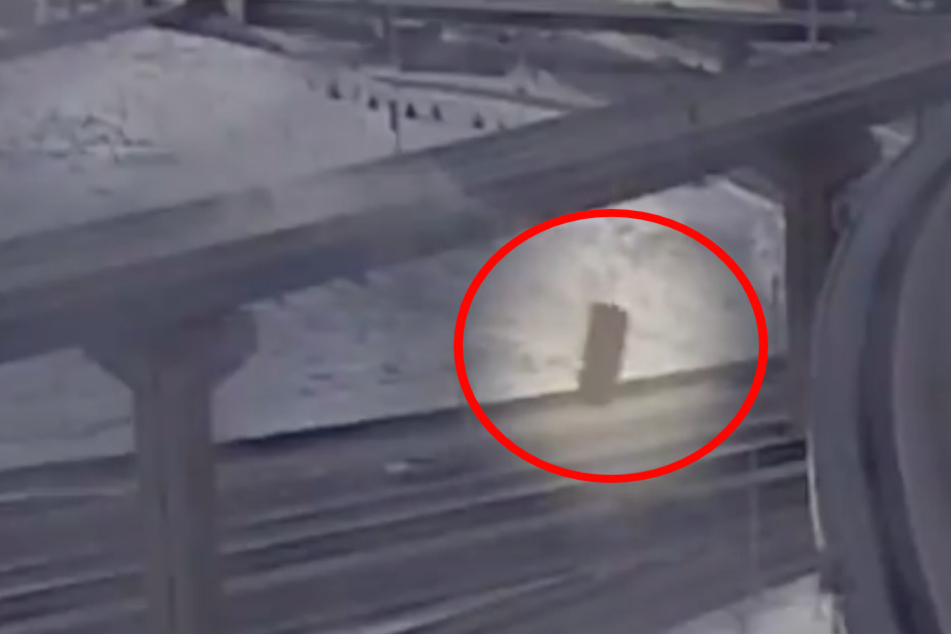 Shocking video shows pick-up driver losing control and plunging off overpass!