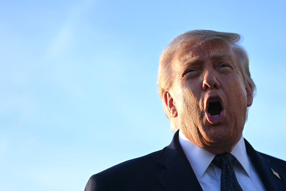 Trump defends Iran deal from critics he calls "fools" ahead of negotiations