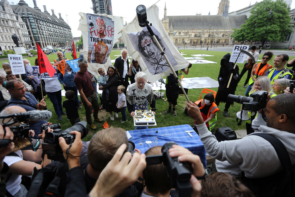 Julian Assange's fiancee, children, and friends celebrated his 50th birthday on July 3 even as he remains locked behind bars.