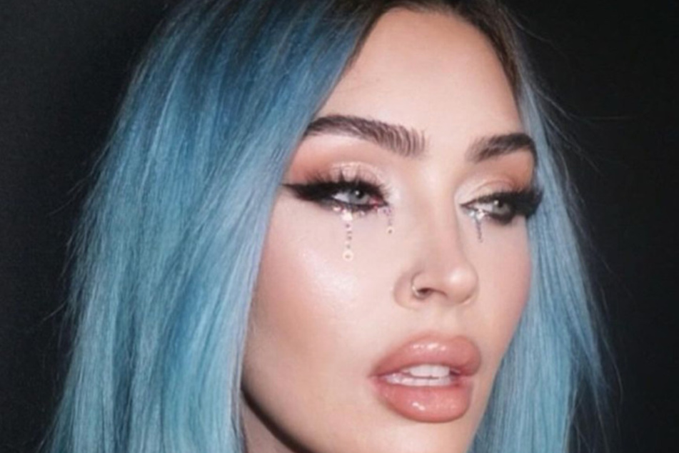 Megan Fox served face in new Instagram selfies after she celebrated Machine Gun Kelly's birthday.