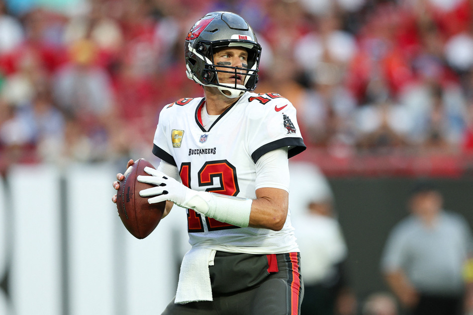 Tampa Bay Buccaneers quarterback Tom Brady drops back to pass against the Los Angeles Rams in the first quarter at Raymond James Stadium.