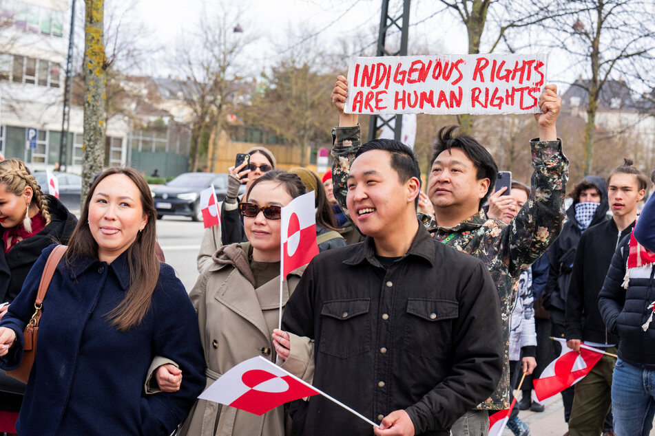 People take part in a Greenlandic "Hands off Kalaallit Nunaat" demonstration at the American embassy in Copenhagen, Denmark, on April 6, 2025.