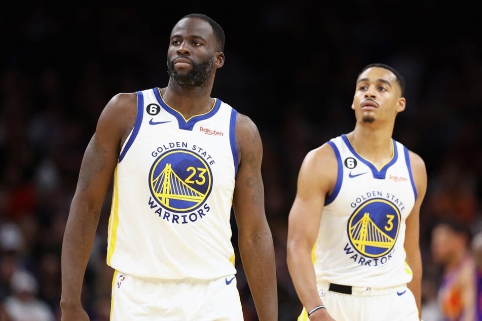 Jordan Poole's father, Anthony, didn't bite his tongue to check Draymond Green (l.) for striking his son.