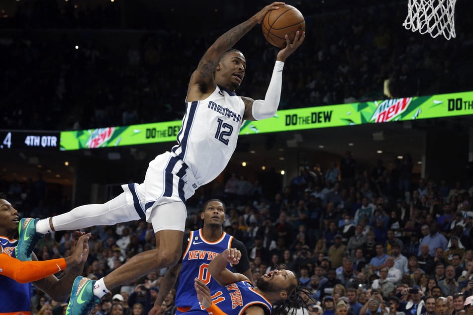 Memphis Grizzlies guard Ja Morant is called for a charge on New York Knicks guard Jalen Brunson with 0.5 second left in regulation at FedExForum.