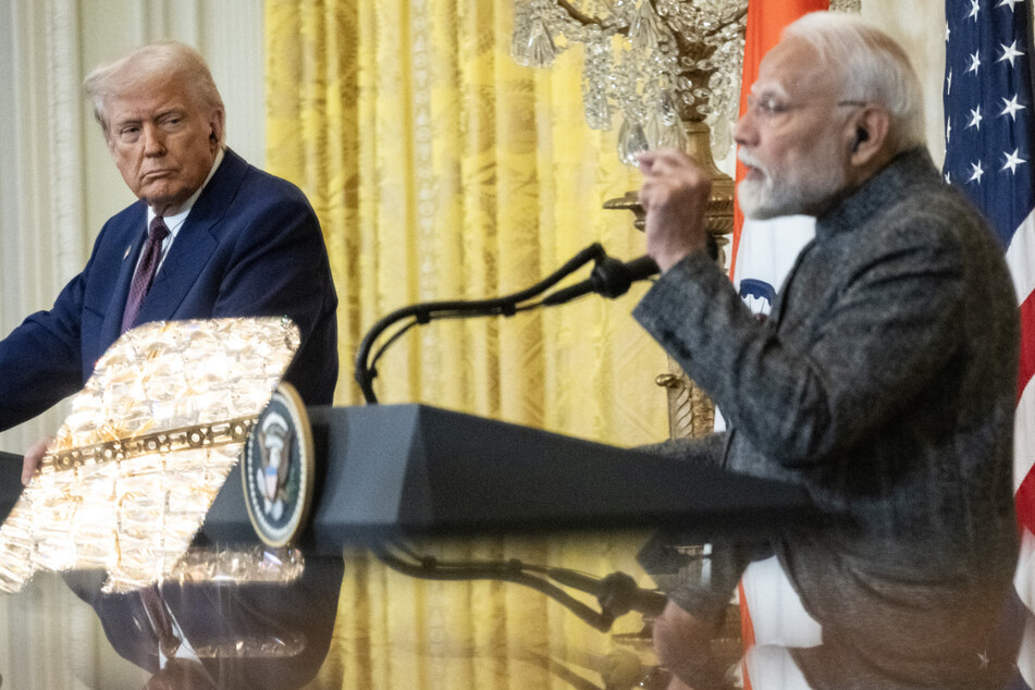 US President Donald Trump (l.) and Indian Prime Minister Narendra Modi hold a joint press conference in the East Room of the White House in Washington DC on February 13, 2025.