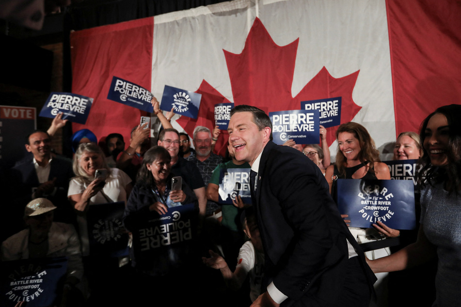 Pierre Poilievre greets supporters after winning a by-election in Alberta's Battle River-Crowfoot riding on August 18, 2025.