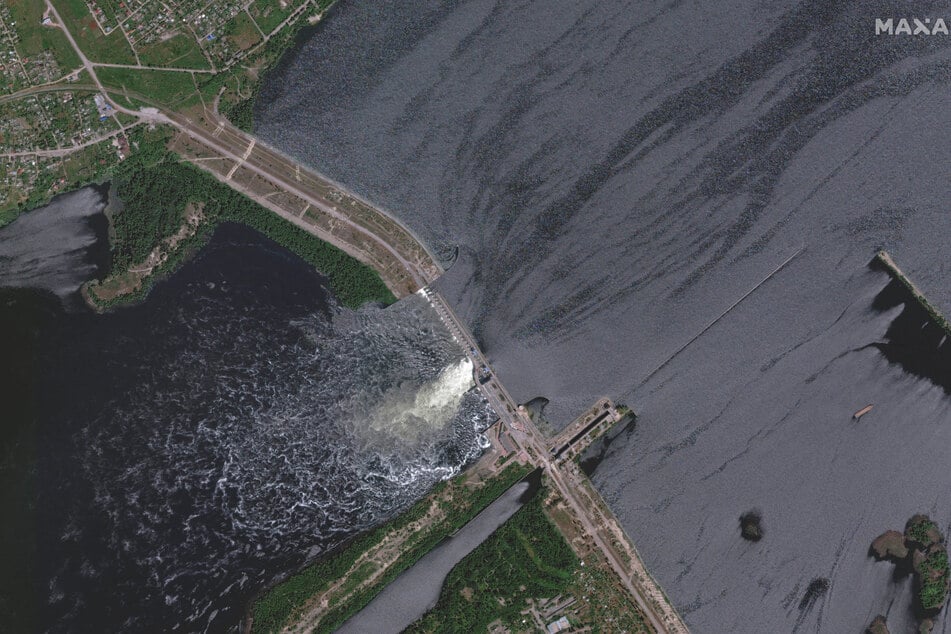 Many thousands more people may be affected downstream as the water unleashed from the reservoir behind the dam cascade down the river.