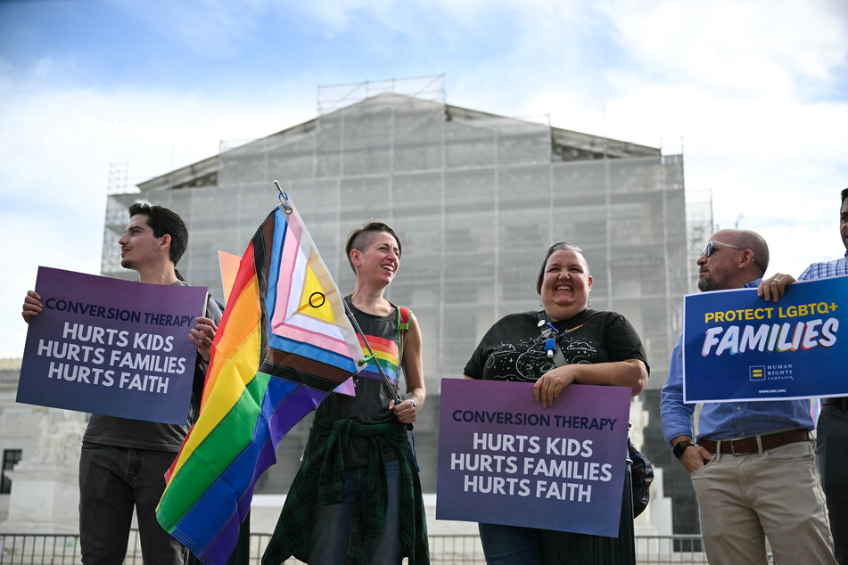Demonstrators protest against conversion therapy outside the US Supreme Court as the Court hears oral arguments in Chiles v. Salazar, a landmark case on conversion therapy, on Tuesday, in Washington, DC.