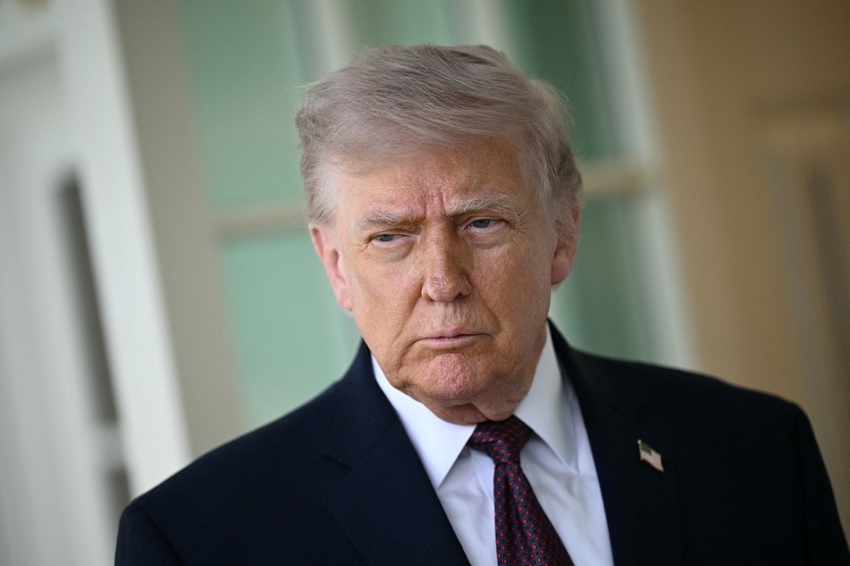 President Donald Trump speaks to the press outside the Oval Office at the White House in Washington, DC, on April 13, 2026.