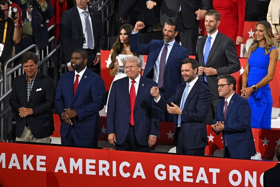 Donald Trump (c) with a number of MAGA allies, including Byron Donalds (l) and JD Vance (r) during the 2024 Republican National Convention on July 15, 2024.