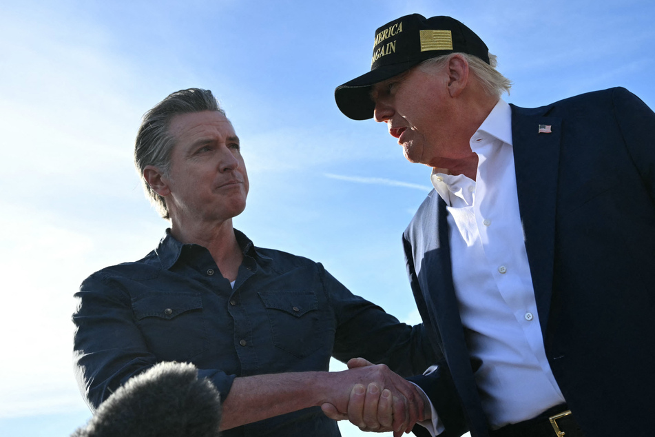 Gavin Newsom's (l.) reach across the aisle comes as the Democrats clash over the best way to fight against Donald Trump.