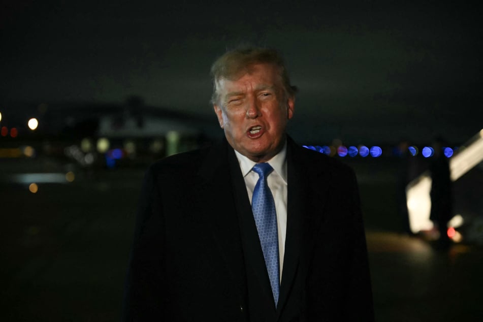 President Donald Trump speaks to reporters after departing Air Force One on September 27. On Monday, he resumed attacks against his critics in a series of posts to Truth Social.