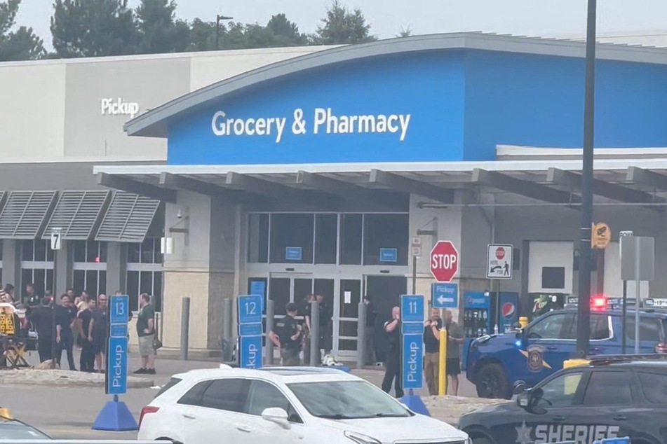 Walmart stabbing suspect charged with terrorism as dramatic footage of good Samaritans emerges