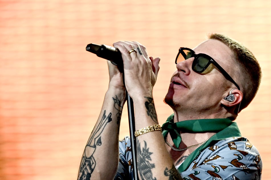 Macklemore to donate his earnings after getting dropped from Ed Sheeran's tour