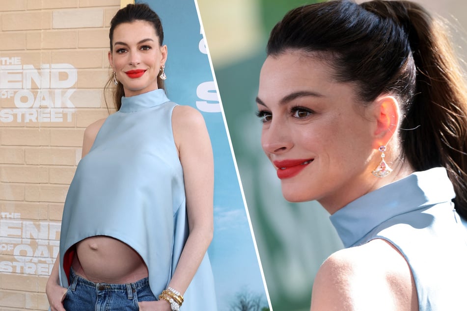 Anne Hathaway, who is expecting her third child, proudly flaunted her baby bump on the red carpet.