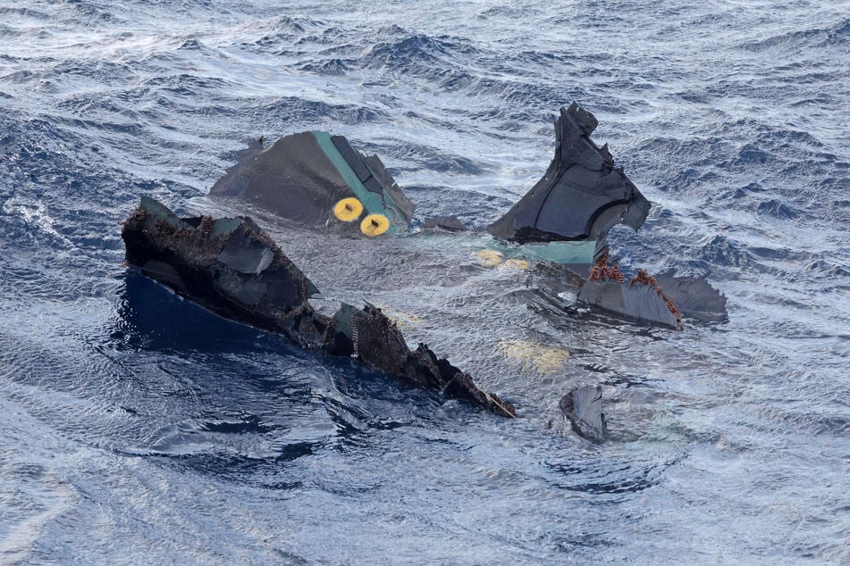 A floating object believed to belong to the US military aircraft V-22 Osprey that crashed into the sea is seen off Yakushima Island, Kagoshima prefecture, western Japan.