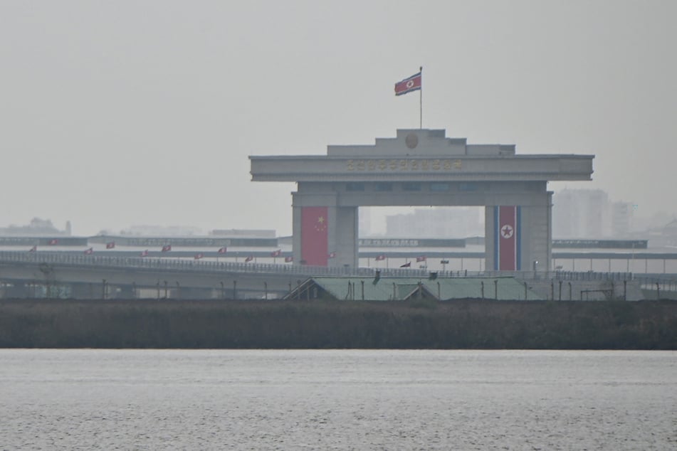 The North Korean side of a new cross-border bridge linking the country with China is pictured from Dandong, Liaoning Province, on October 15, 2026.