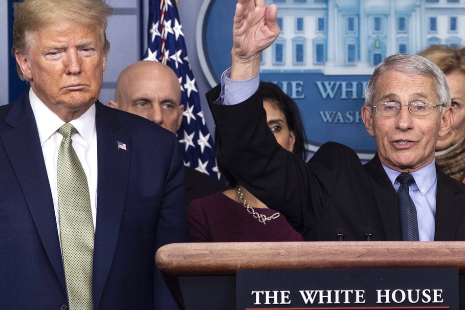 Trump slams virus expert Fauci as a "disaster" as election day nears
