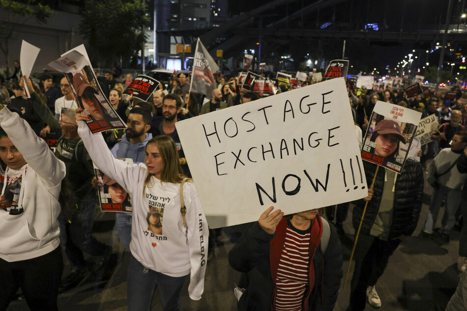 Families and supporters of hostages held by Palestinian militants since the October 7 attack held demonstrations outside the Israeli ministry of defense in Tel Aviv, Israel, on Friday and Saturday, calling for an immediate deal with Hamas.