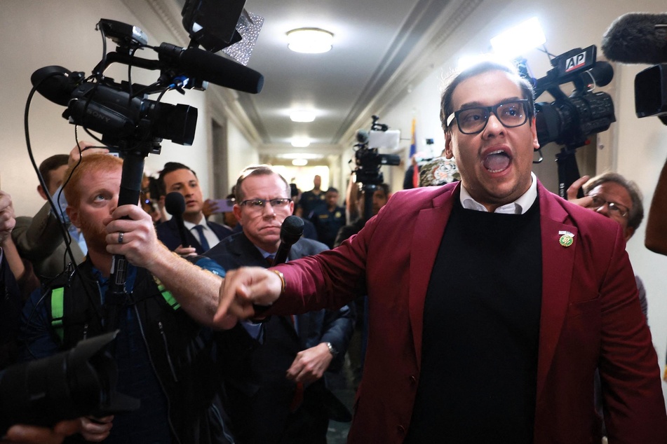 George Santos calls Capitol protester "human scum" while carrying mystery baby