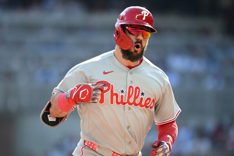 Kyle Schwarber #12 of the Philadelphia Phillies celebrates a home run against the Atlanta Braves during Game 2 of the NL Wild Card Series on Wednesday. The Phillies will now go to a deciding Game 3 against the Braves.