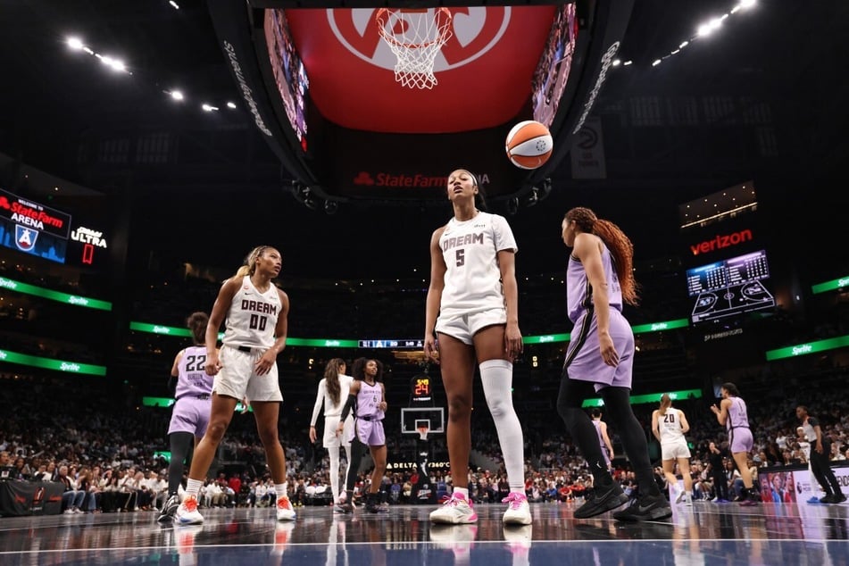 Angel Reese of the Atlanta Dream reacts to a play in Game 4 of the WNBA Finals. The series is now tied 2-2 as Game 5 heads to San Francisco, California.