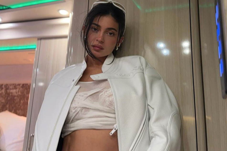 Kylie Jenner explained how motherhood made her "love" herself more.