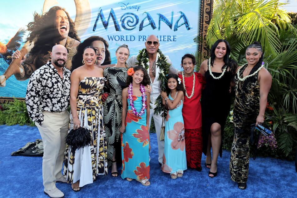 Dwayne "The Rock" Johnson graces red carpet with three daughters at Moana premiere