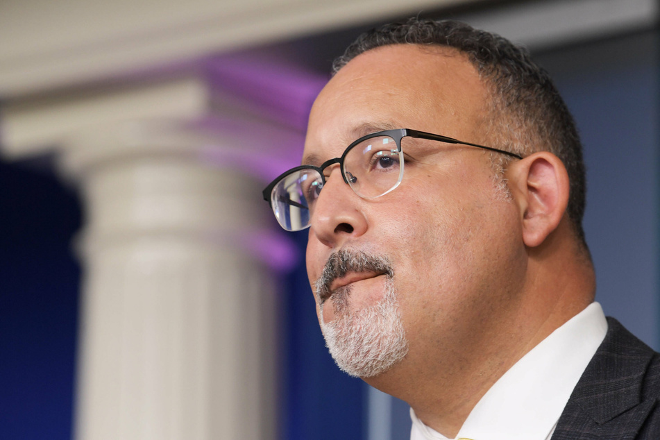 Biden's Education Department, led by Miguel Cardona, announced it will not release its proposed Title IX changes until May 2022.