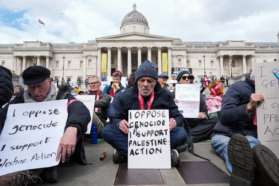 Protesters gather to call for the lifting of the ban on Palestine Action during a demonstration in Trafalgar Square in central London on April 11, 2026.