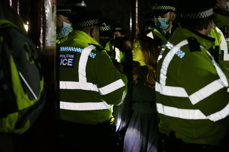 Patsy Stevenson (center) was among the protesters who were brutally arrested during the vigil.