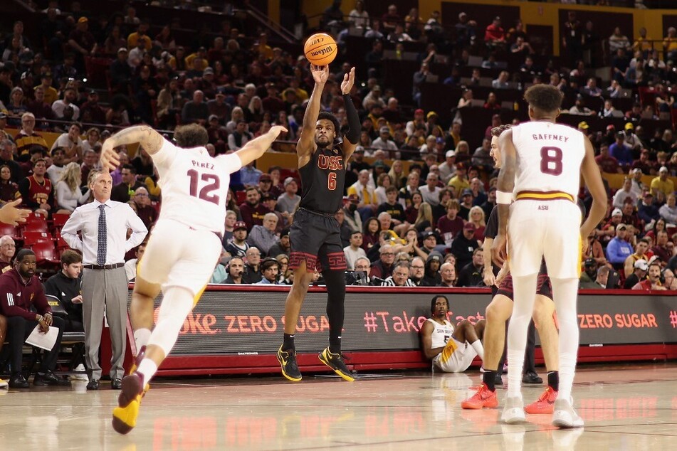 Bronny James (c) may benefit from another year in college hoops to boost his draft stock and continue his on-court development.