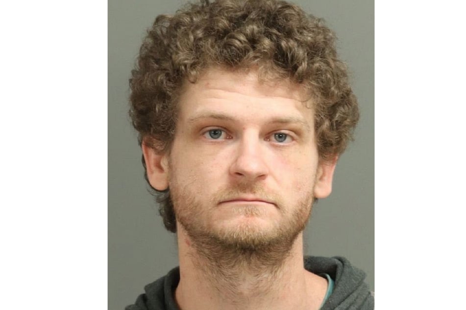 Ethan Jamieson (27) allegedly attacked three men with a gun.