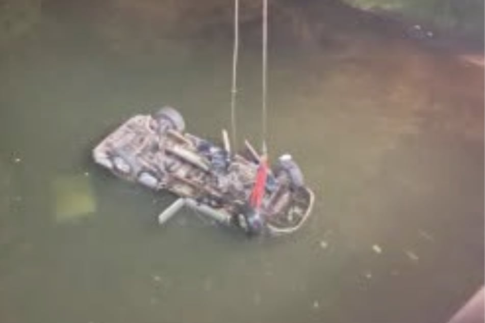 The pickup flipped over and ended up upside down in Nimishillen Creek.