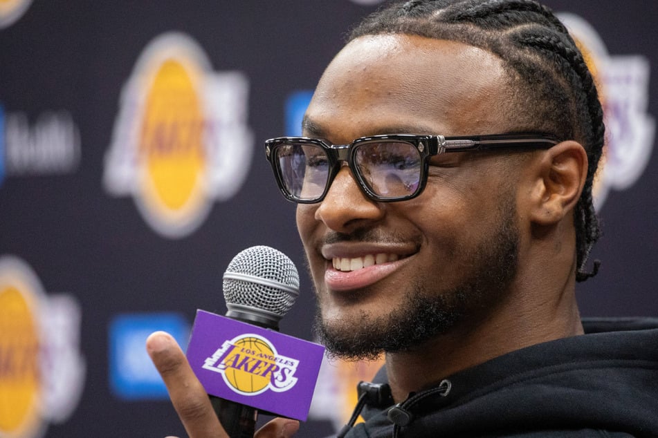 Bronny James said Tuesday he is ready to deal with the pressure of playing alongside his NBA superstar dad as he was formally unveiled by the Los Angeles Lakers.