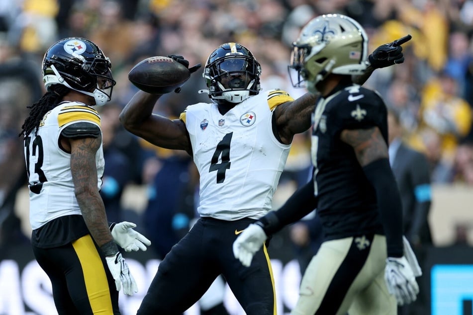 Pittsburgh Steelers wide receiver DK Metcalf (c.) reacts after making a catch during the NFL Paris Game on Sunday. The Steelers were victorious