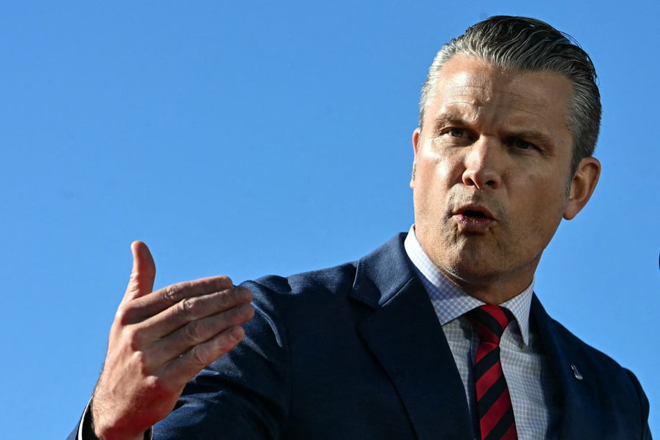 Defense Secretary Pete Hegseth speaks ahead of President Donald Trump at Anduril Industries in Sparrows Point, Maryland, on October 6, 2026. The outcome of a review of the US military presence in Europe is expected to be presented to the secretary next month. 