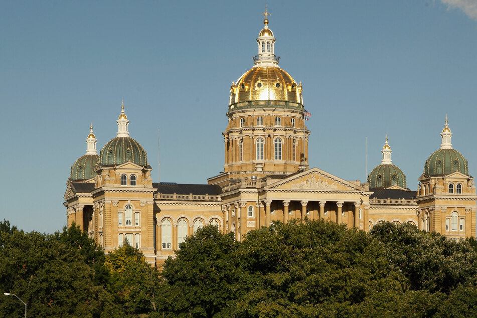 An Iowa law that would empower state and local law enforcement to charge and deport some migrants has been temporarily blocked.