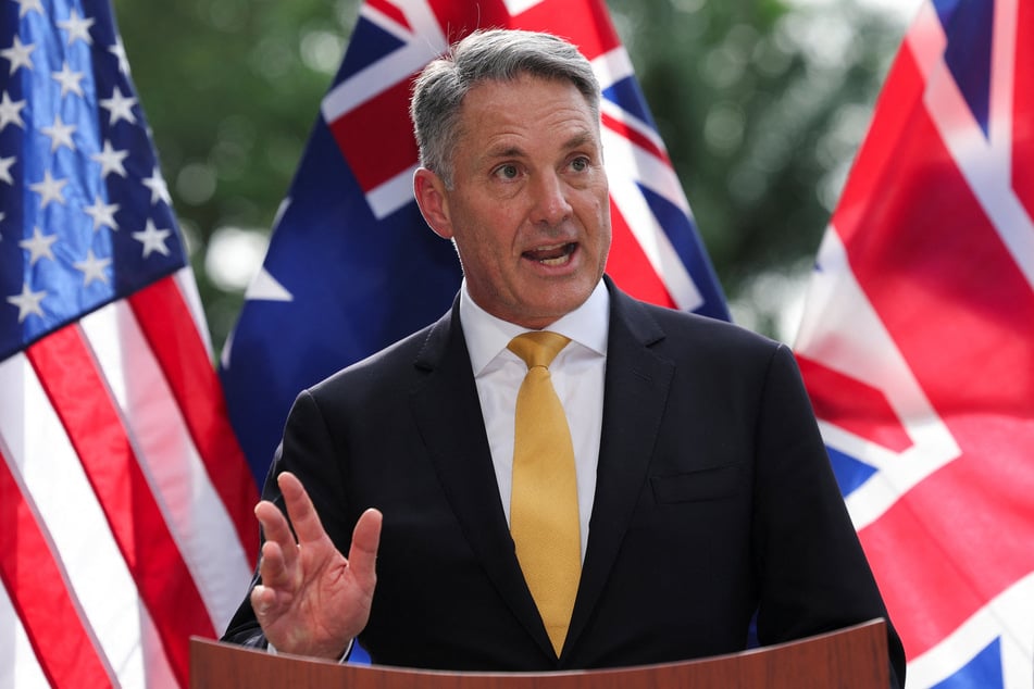 Australian Defense Minister Richard Marles speaks during an AUKUS Defense ministers' press huddle at the US Embassy in Singapore on May 30, 2026.