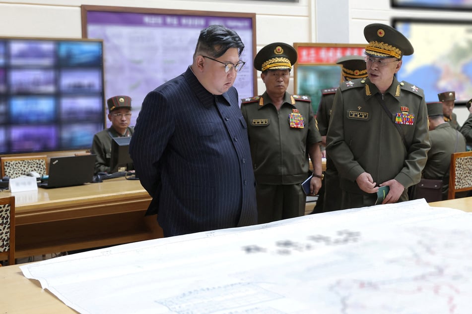 North Korea stages nuclear strike drill and rails against "military gangsters"