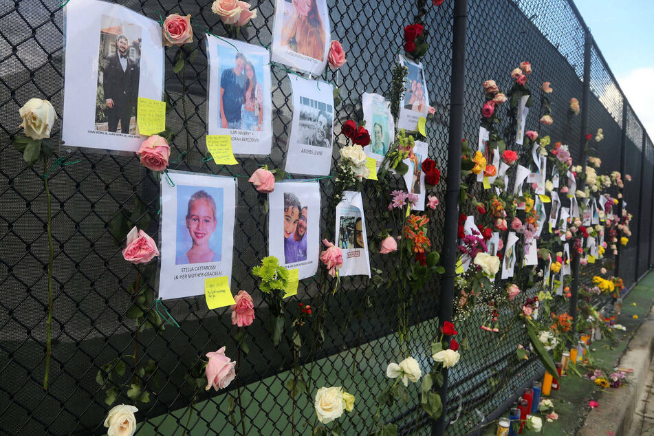A makeshift memorial shows some of the people missing after the Champlain Towers condominium collapse.