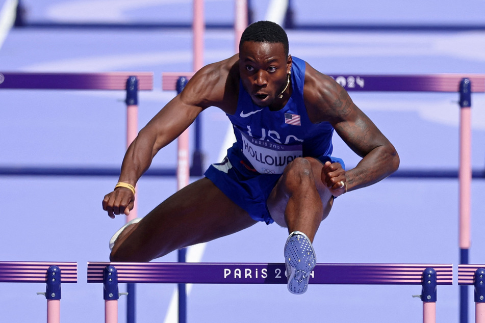 Team USA's Grant Holloway in action during heat 5 of the men's 110m hurdles round 1 at the Paris Olympics.
