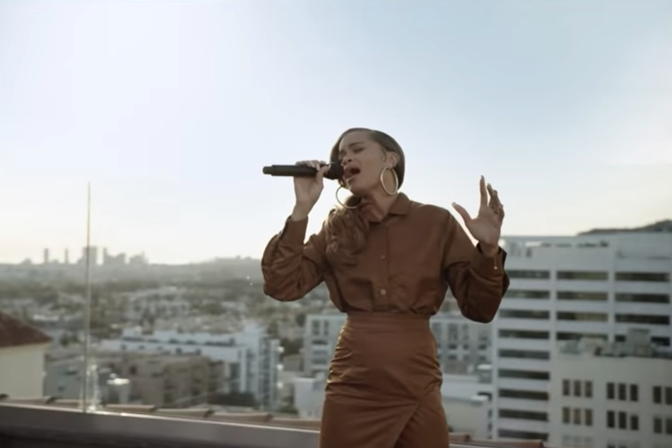 Andra Day performing her single Rise Up, in a video that also featured young ice-skater Kaitlyn Saunders.