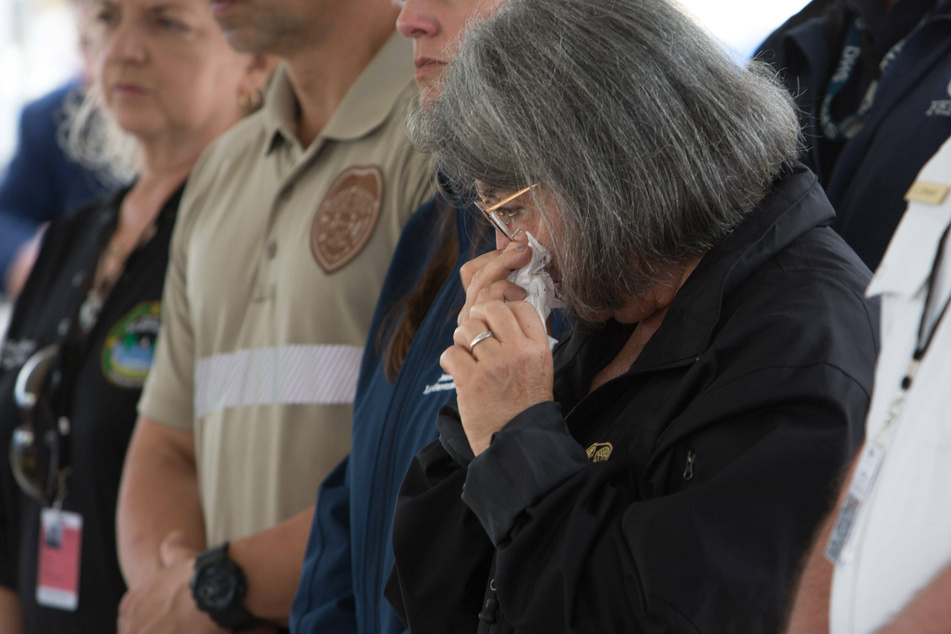 Miami-Dade Mayor Daniella Levine Cava (first r) participated in a press briefing at the site of the collapsed building in Miami-Dade County, Florida on Wednesday as it transitioned to a recovery operation.