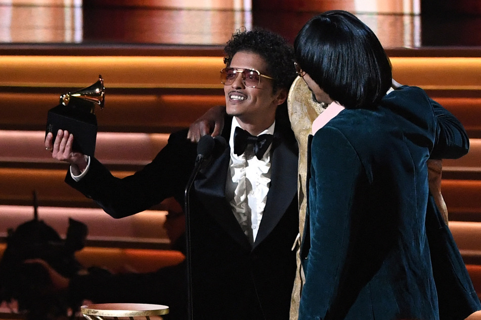 Silk Sonic took home four Grammys at the 2022 Grammy Awards for Leave The Door Open, the lead single off their debut album An Evening With Silk Sonic.