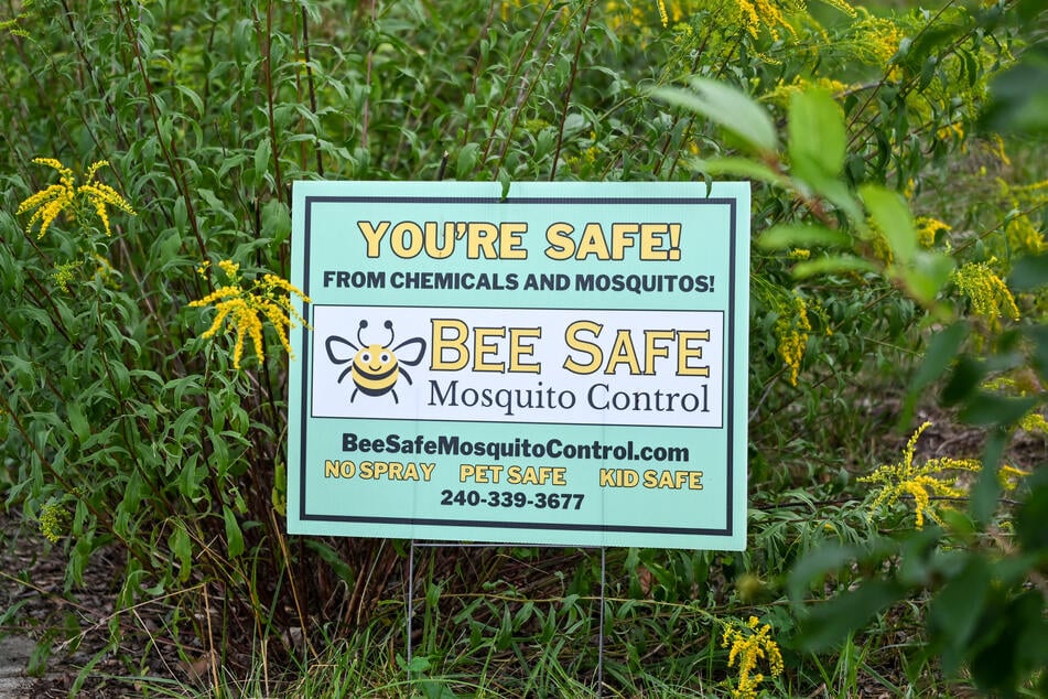 A sign for Bee Safe Mosquito Control is pictured in Silver Spring, Maryland, on August 4, 2026.