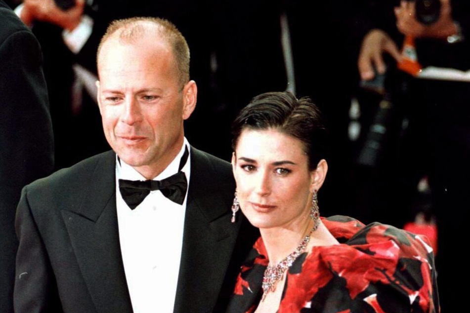 Bruce Willis and ex-wife Demi Moore (r.) pictured in 1997.